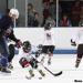 David Booth joins a group of youth players on the ice during the Orientation Camp.