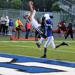 Westonka White Hawks football player makes a catch in the end zone