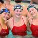 Three swimmers in pool