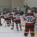 girls hockey team celebrates goal