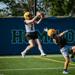 Minneapolis Roosevelt football player leaps to catch a pass during a scrimmage at Blake