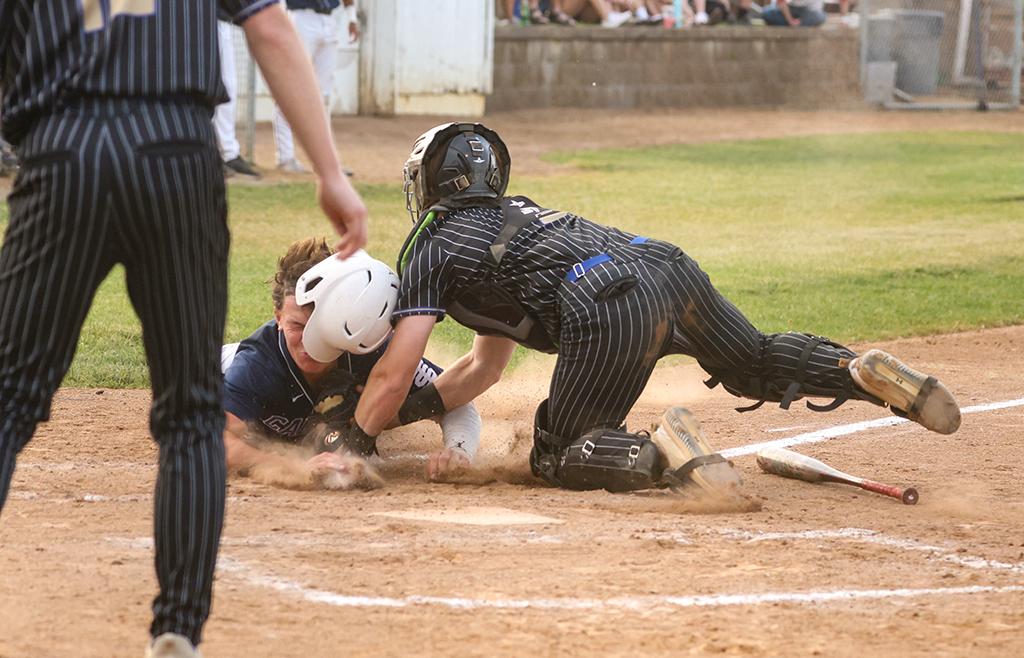 Academy of Holy Angels' catcher Will Briggs protects home plate. Briggs' RBI double helped the Stars to a 4-0 lead in the top of the first inning. Photo by Cheryl A. Myers, SportsEngine