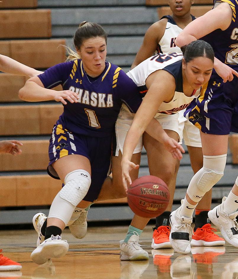 Destinee Bursch (1) dives for a loose ball late in the second half. Bursch tallied a team-high 25 points for Chaska. Photo by Cheryl Myers, SportsEngine