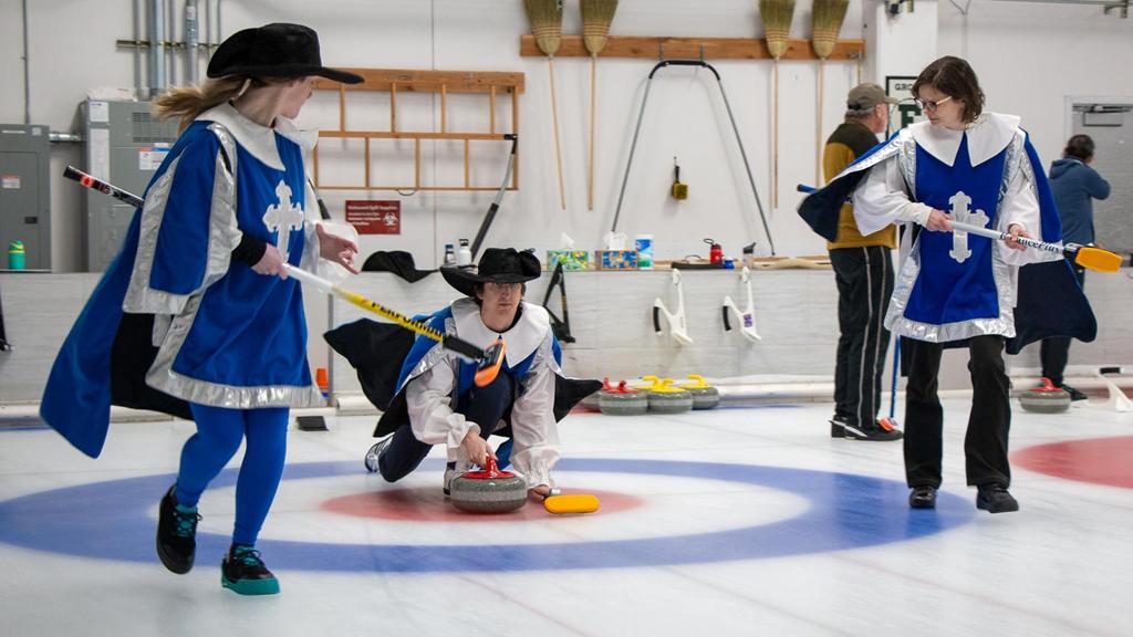 Three Musketeers deliver a stone