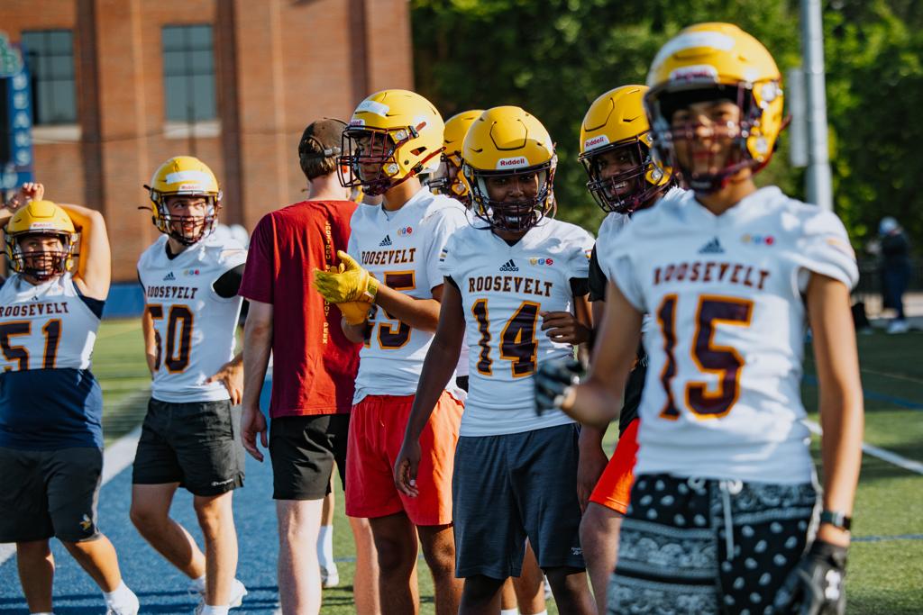 Minneapolis Roosevelt football players during a scrimmage at Blake