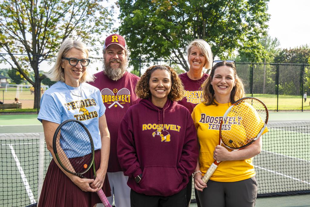 Minneapolis Roosevelt Girls Soccer Coaches stand on the courts at Lake Hiawatha