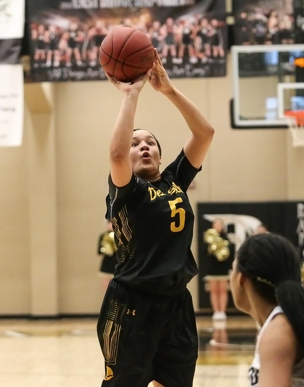 Mary Claire Francois shoots from the top of the key. Francois, along with teammates Kiani Lockett, Sydney Runsewe and Mya Williams, each scored nine points leading a team effort in their 68-54 win over St. Paul Como. Photo by Cheryl Myers, SportsEngine