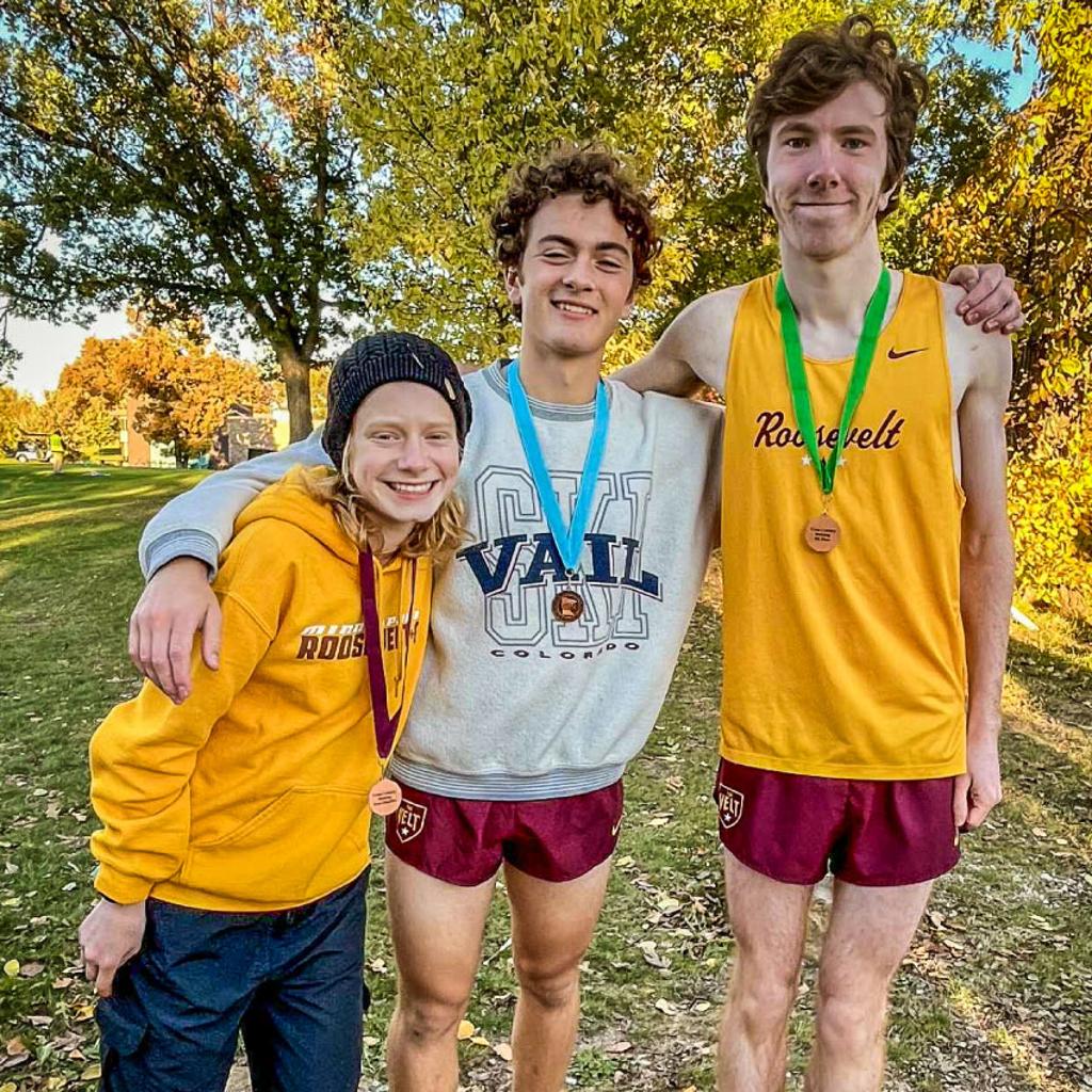 Image of Roosevelt Cross Country runners with their Section Medals