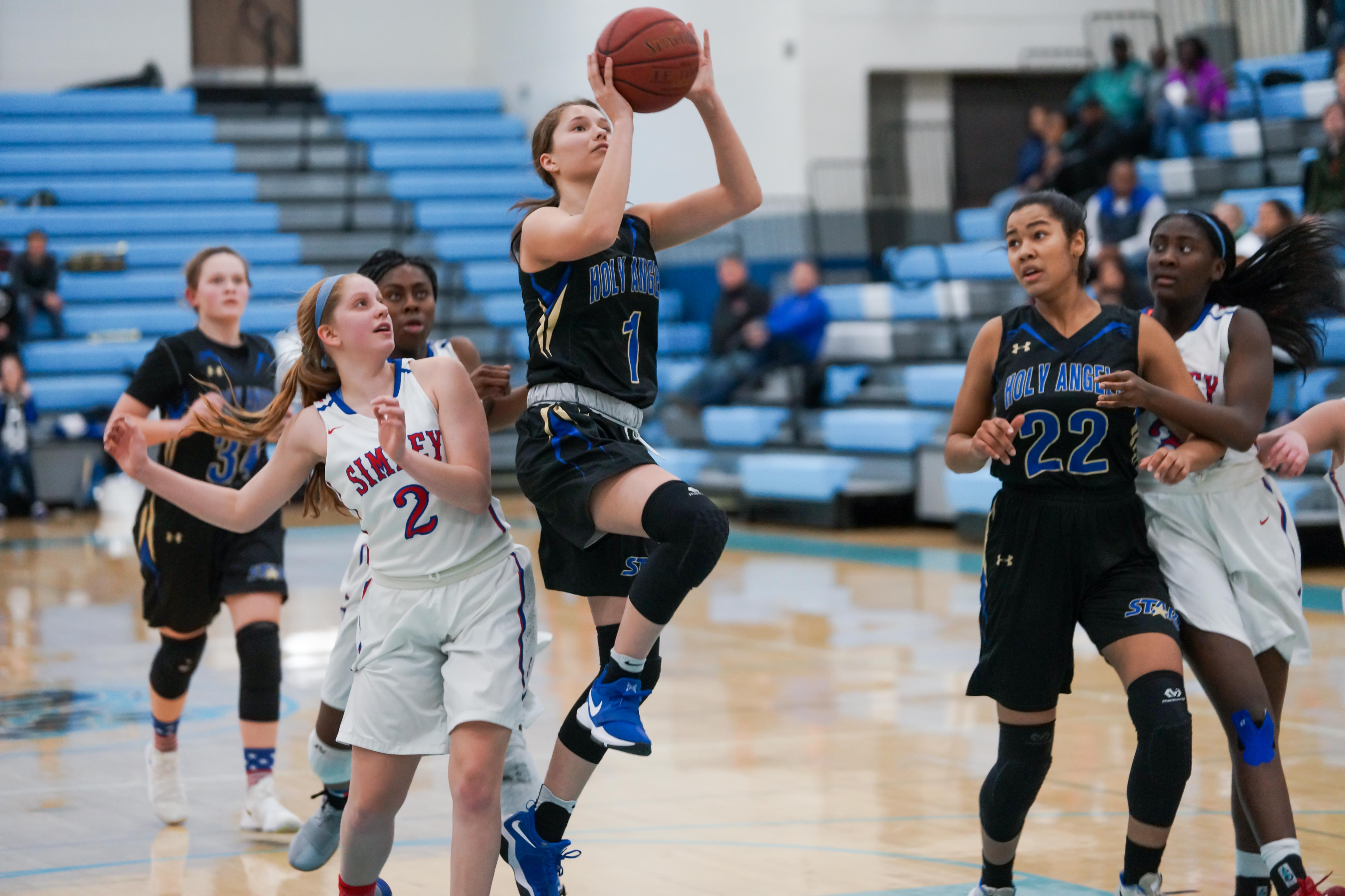 Freshman guard Francesca Vascellaro (1) led Holy Angels with 13 points in a 41-40 Class 3A, Section 3 championship victory. Photo by Korey McDermott, SportsEngine