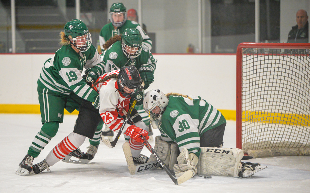 Holy Family Catholic goalie Sedona Blair gets a shutout Thursday night against Centennial with the Fire defeating the Cougars at Centennial 3-0. Photo by Earl J. Ebensteiner, SportsEngine