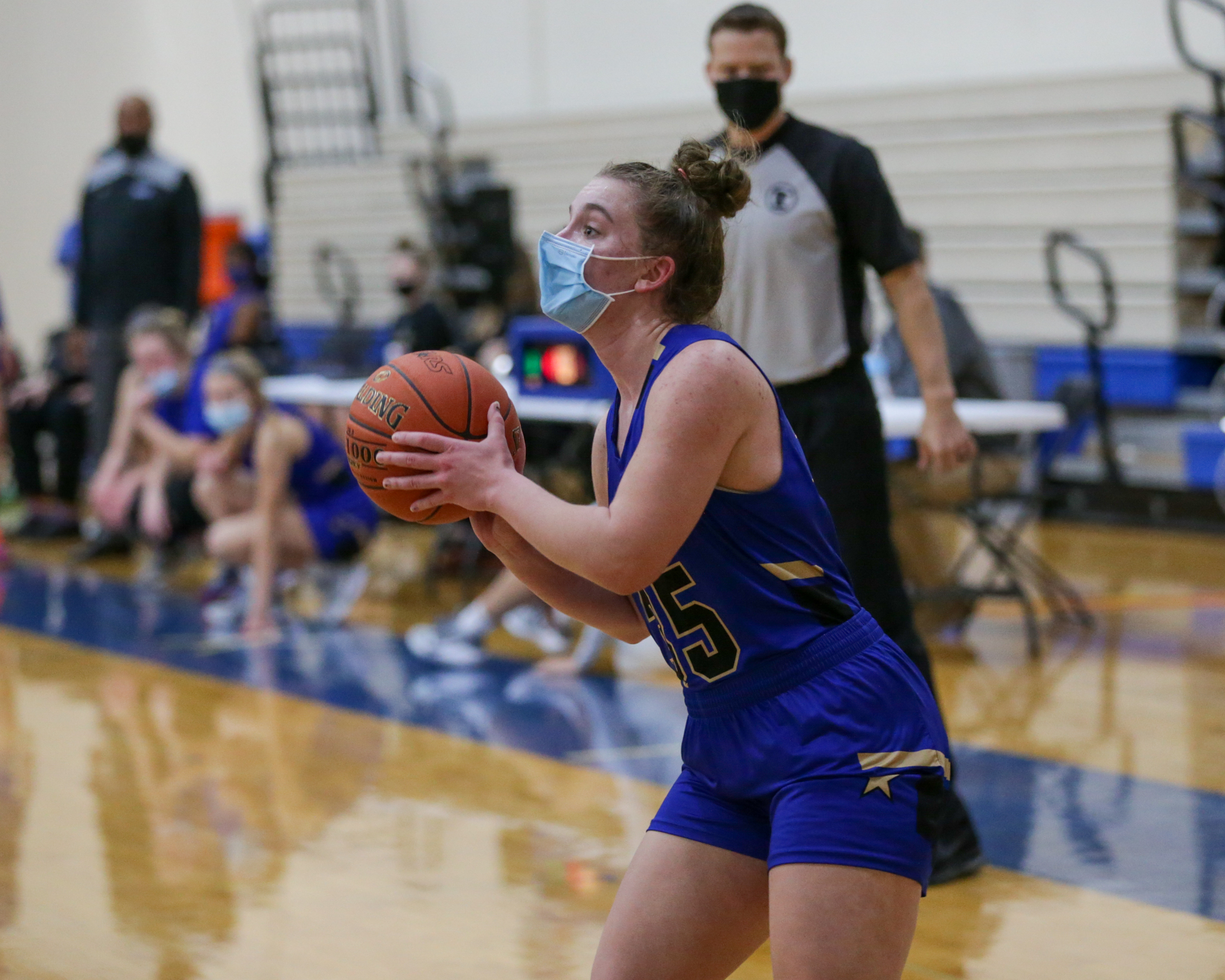 Holy Angels' Jenna Buer (35) spots up for a three-point attempt against DeLaSalle Friday night. Buer had 16 points in the Stars’ 96-69 victory over the Islanders in Richfield. Photo by Jeff Lawler, SportsEngine