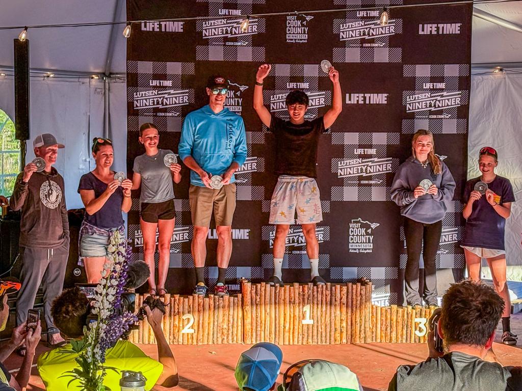 Minneapolis Roosevelt MTB rider Ben Tesch on the podium in 1st place at the Lutsen 99er award ceremony