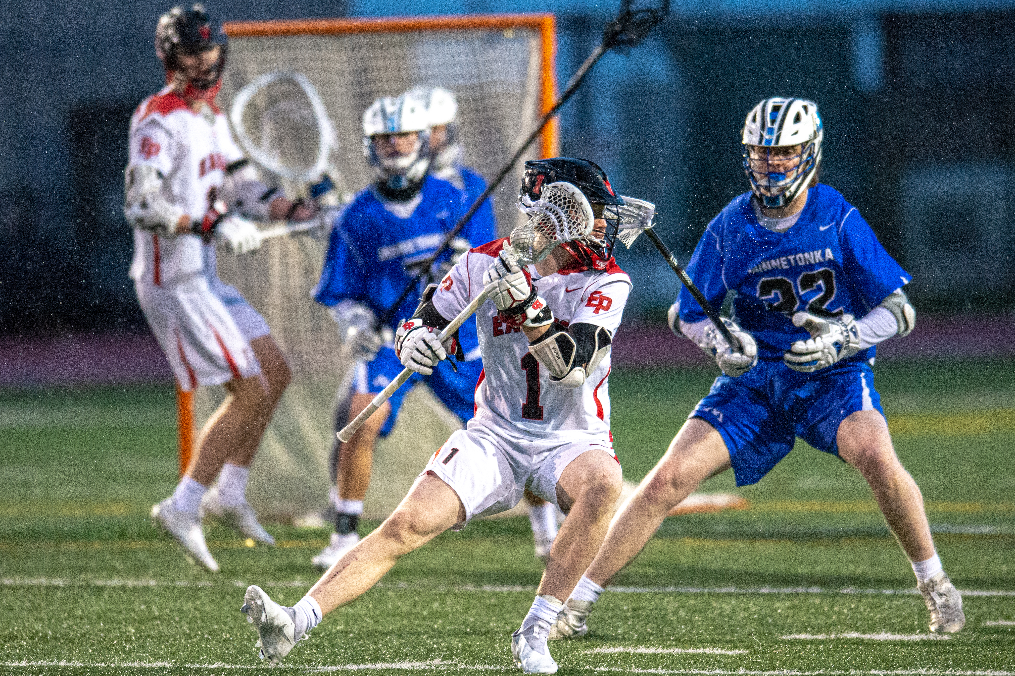 Will Foster evades Minnetonka defenders on April 27 at Eden Prairie High School. Foster was named 2021 Mr. Lacrosse. Photo by Earl J. Ebensteiner, SportsEngine