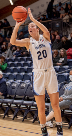 Maddy Siegrist shoots a basketball