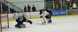 Zach Erickson beats the Century defense and "tees up" the puck for a trailing teammate.