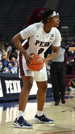 Jordan Obi holds a basketball