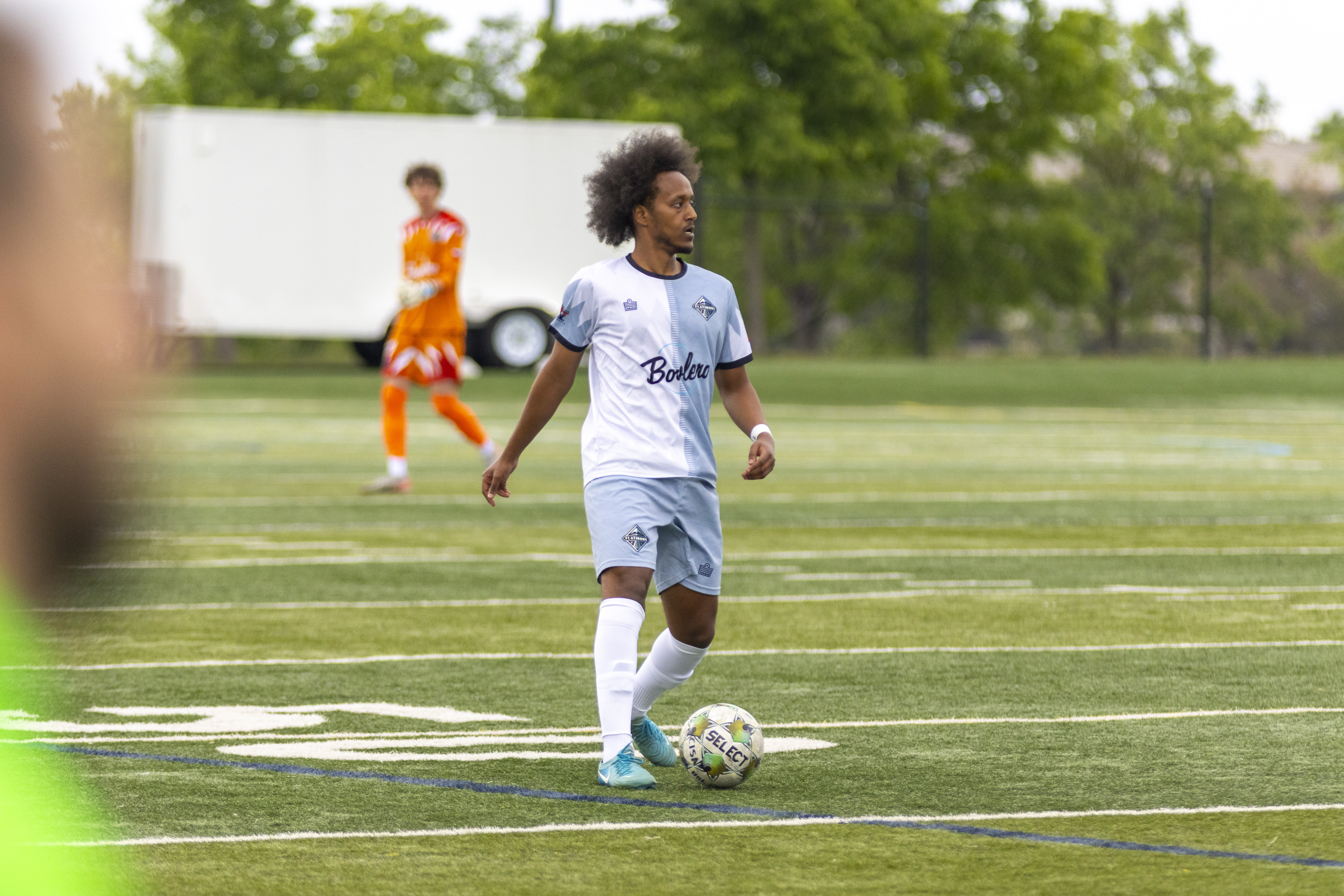 Daniel Tareke passes the ball