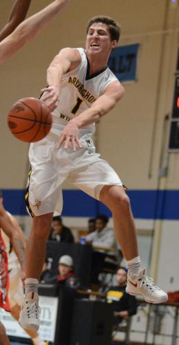 Collin Gillespie passes the basketball