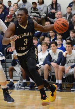 Zane Martin dribbles a basketball