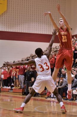 Hunter Kraiza shoots a basketball